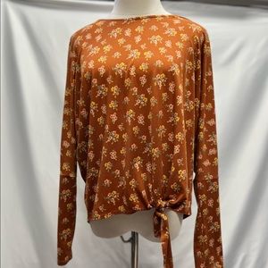 This shirt is from IZ Byer and size Medium